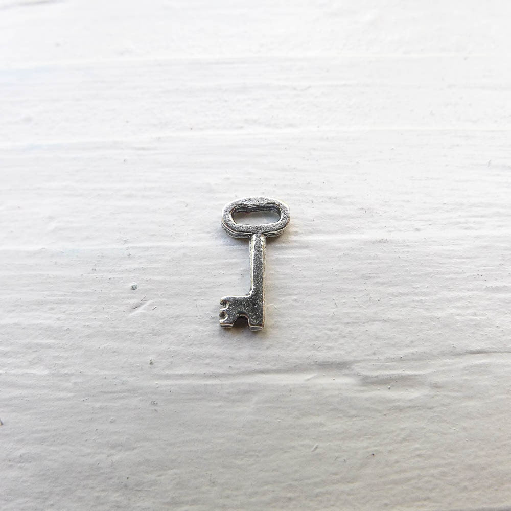 Tiny Key Charm Sterling Silver