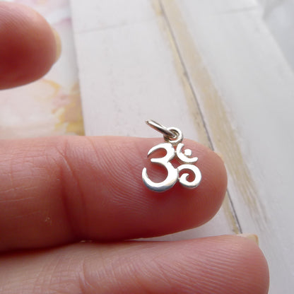 Tiny Om Charm Sterling Silver
